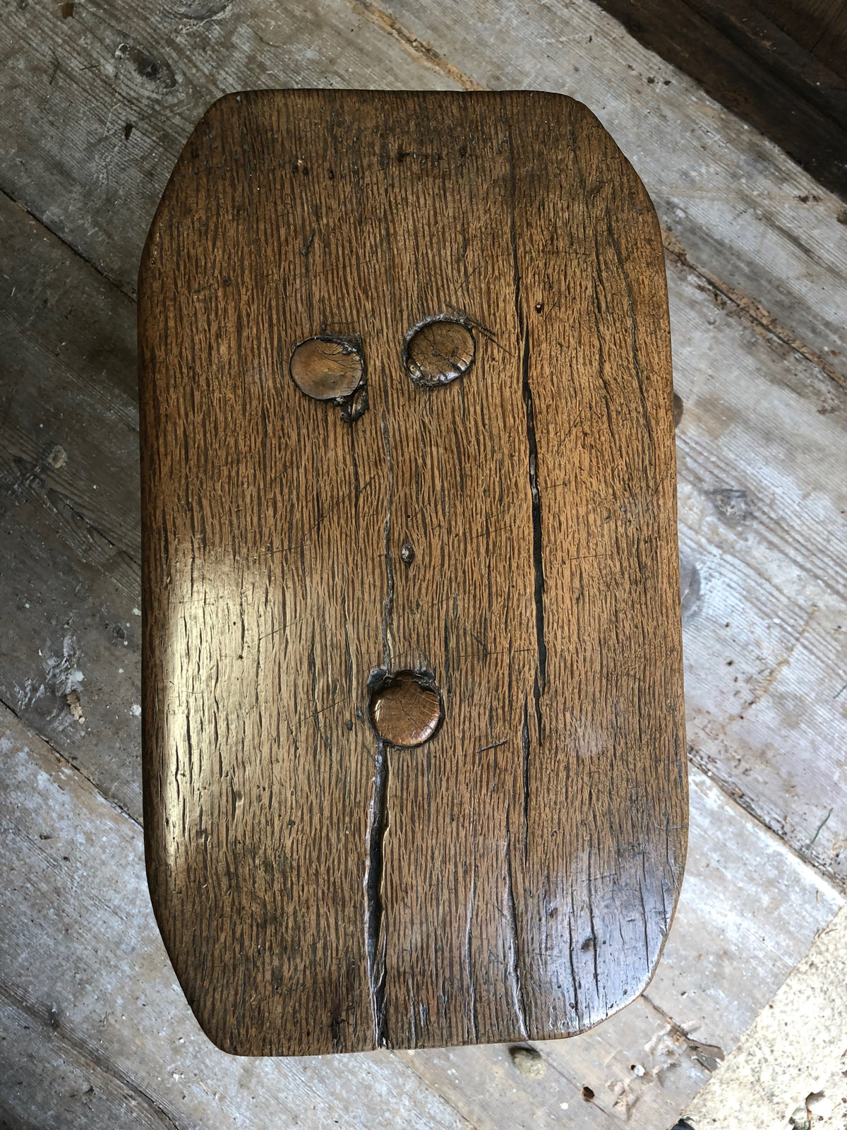 An excellent primitive George III three legged stool of good colour