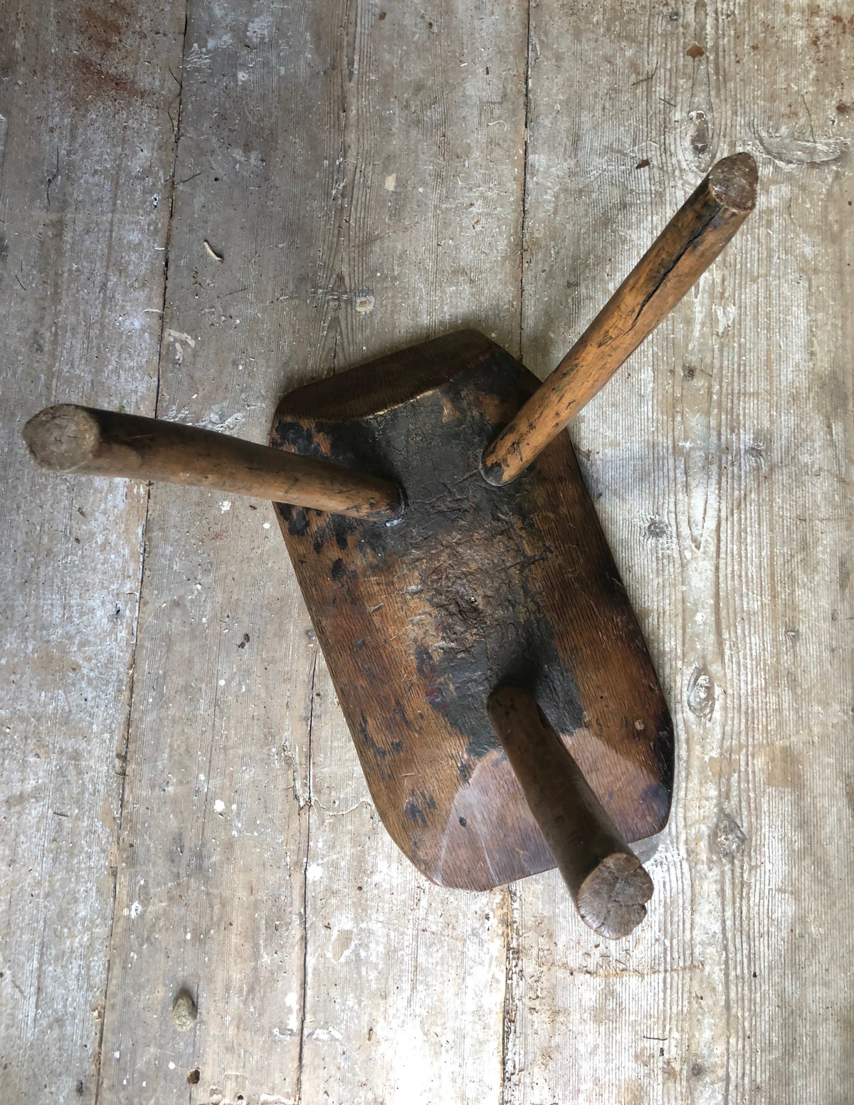 An excellent primitive George III three legged stool of good colour