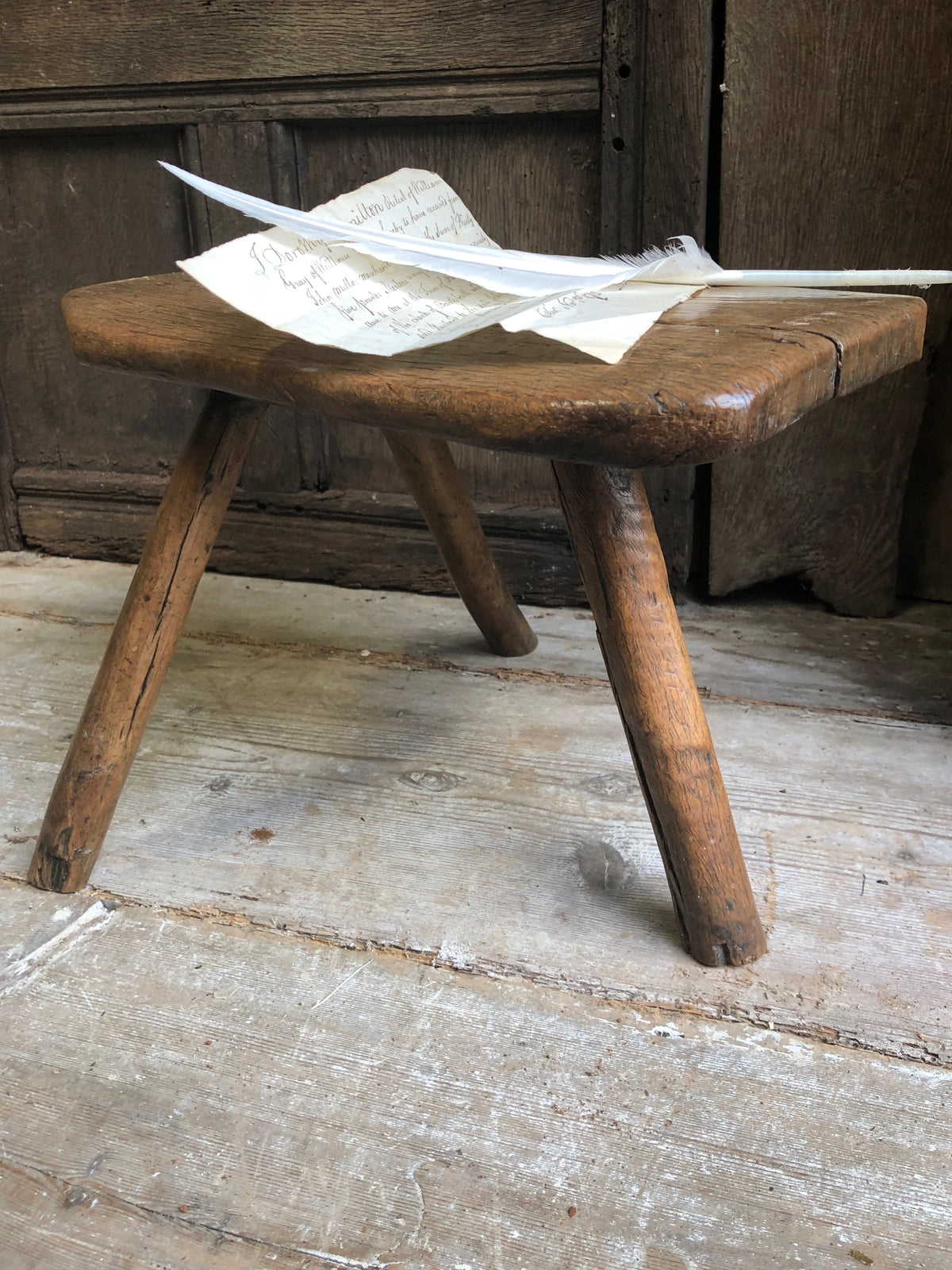 An excellent primitive George III three legged stool of good colour