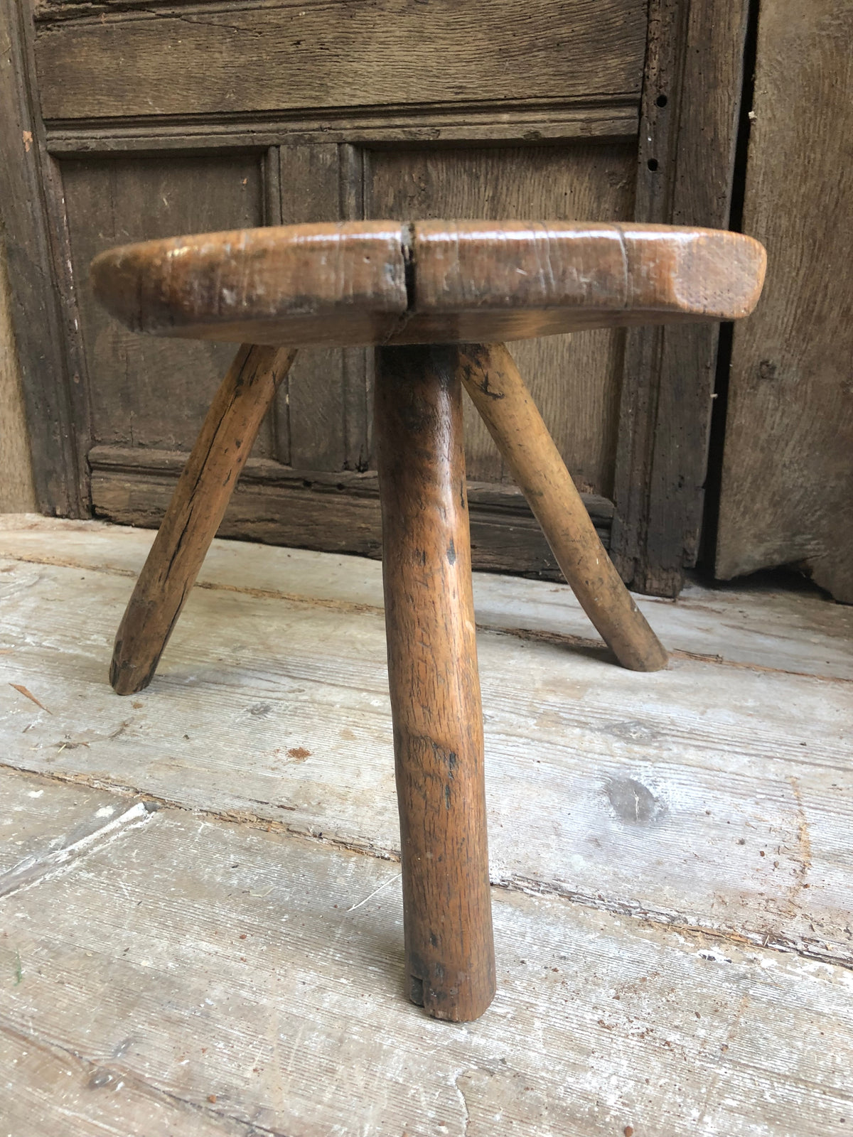 An excellent primitive George III three legged stool of good colour
