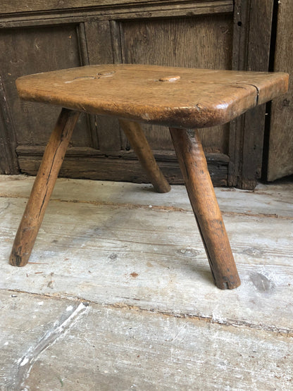 An excellent primitive George III three legged stool of good colour