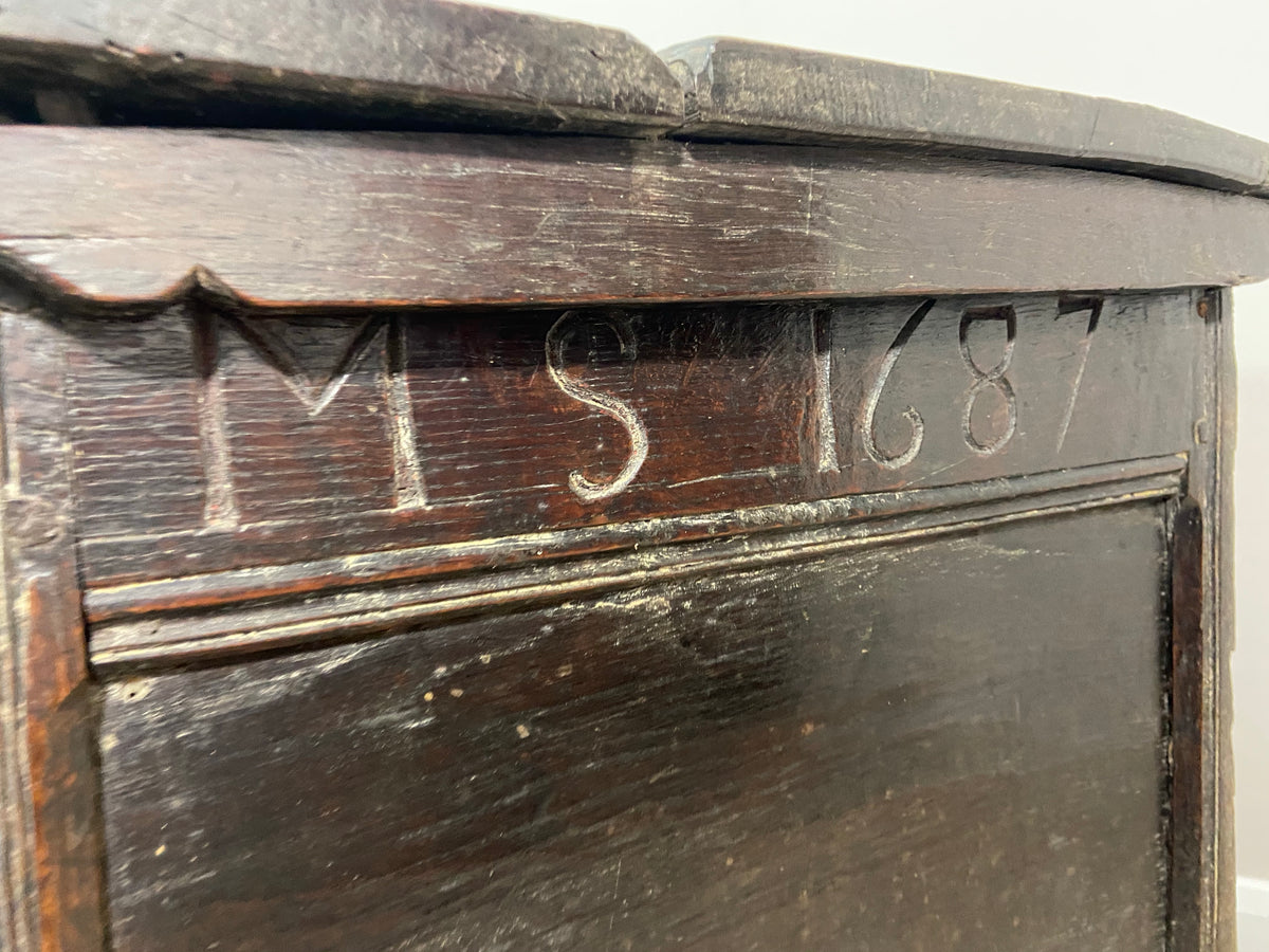 A 17th century Ottery St. Mary, Exeter joined oak chest highly likely from the same workshop in which Thomas Dennis apprenticed, 1687