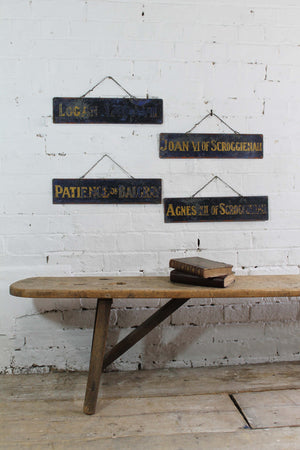 Set of four tole prize cow exhibition name plates from a Scottish farm