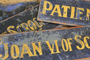 Set of four tole prize cow exhibition name plates from a Scottish farm