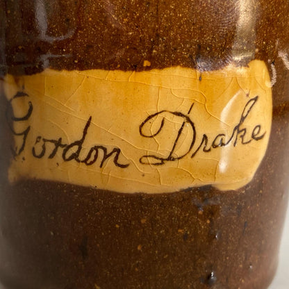 A slipware mug by Isaac Button of Soil Hill, Halifax