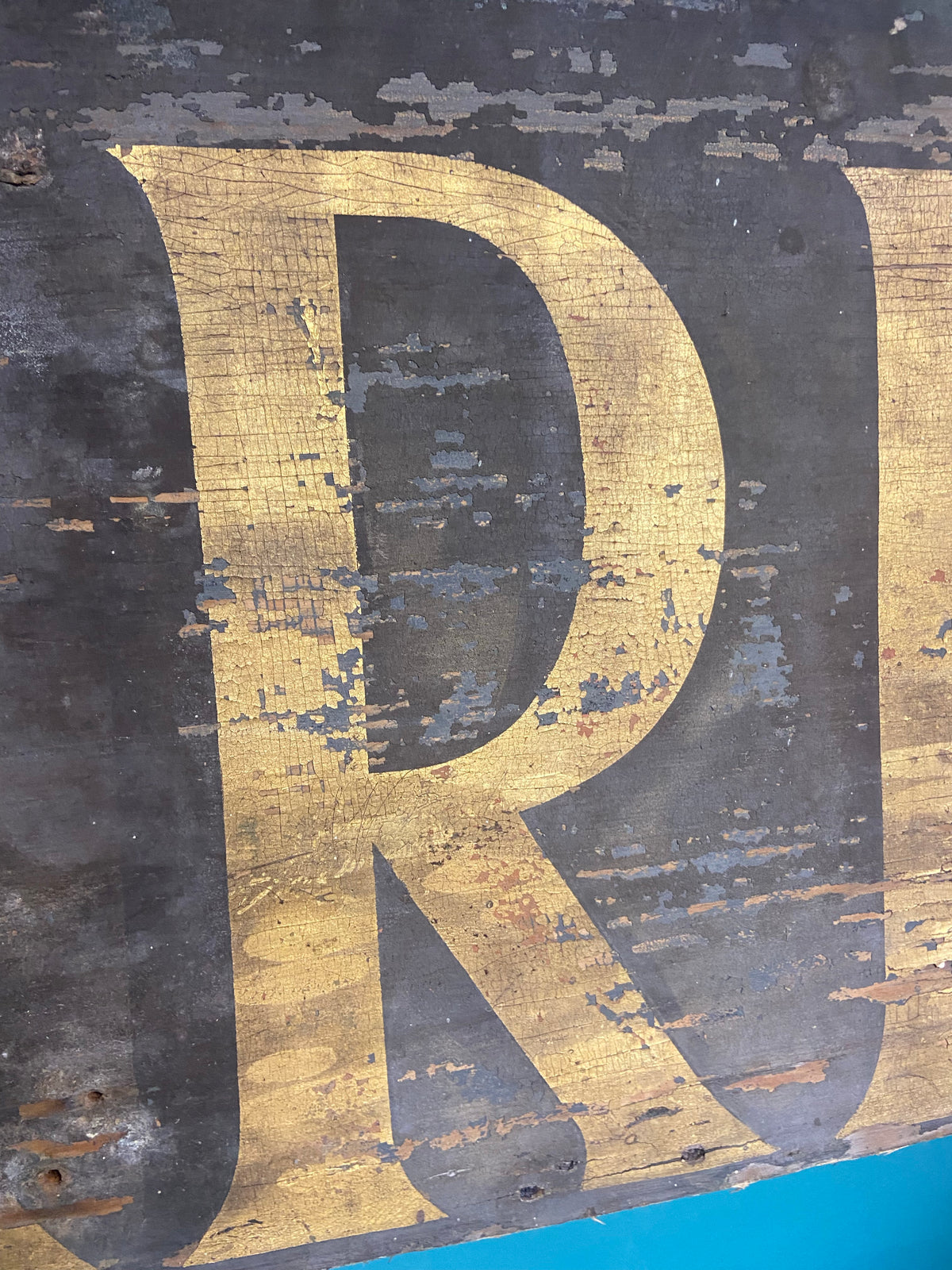 An original Victorian ‘Charles Dickens Library’ sign in the original gilt finish