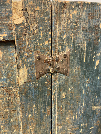 A small Georgian cupboard c. 1780 in the original blue paint