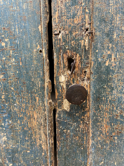A small Georgian cupboard c. 1780 in the original blue paint