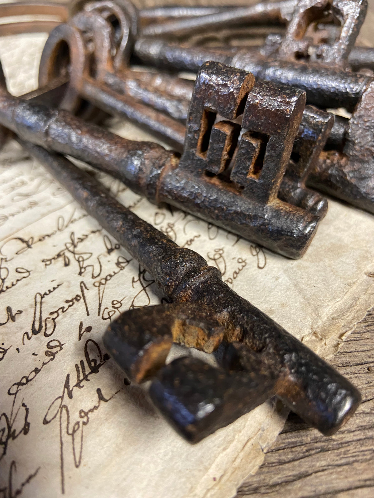 A set of 17th century large iron keys on original iron hoop