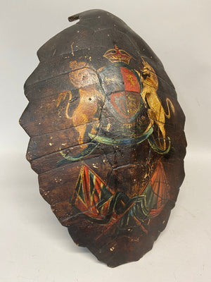 An early 19th century sailor’s hand painted turtle shell with hand painted Royal Standard