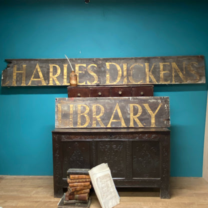 An original Victorian ‘Charles Dickens Library’ sign in the original gilt finish
