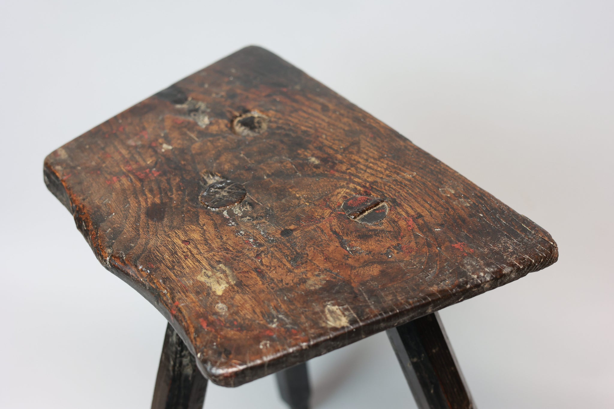 A good George III stool of good colour with unusual shaped seat