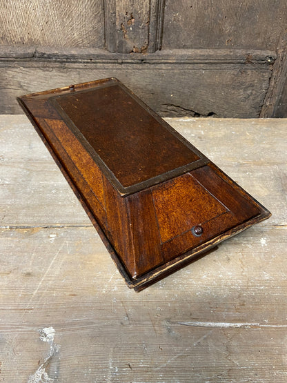 A Regency papier mache candle box in the form of a sarcophagus