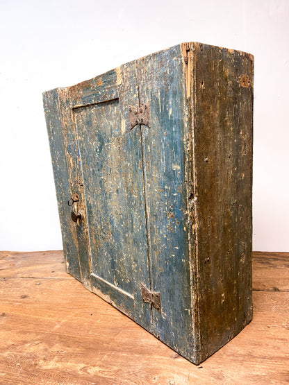 A small Georgian cupboard c. 1780 in the original blue paint