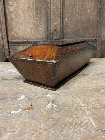 A Regency papier mache candle box in the form of a sarcophagus