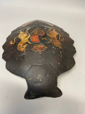 An early 19th century sailor’s hand painted turtle shell with hand painted Royal Standard