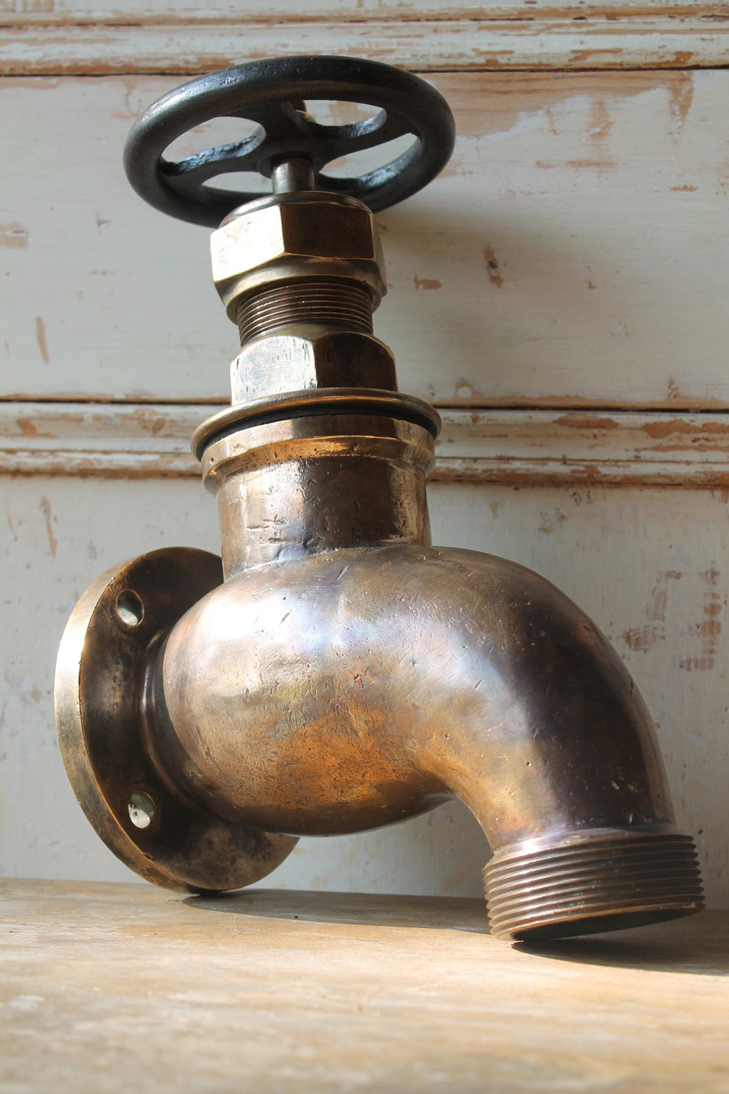 Early 20th c oversized brass tap